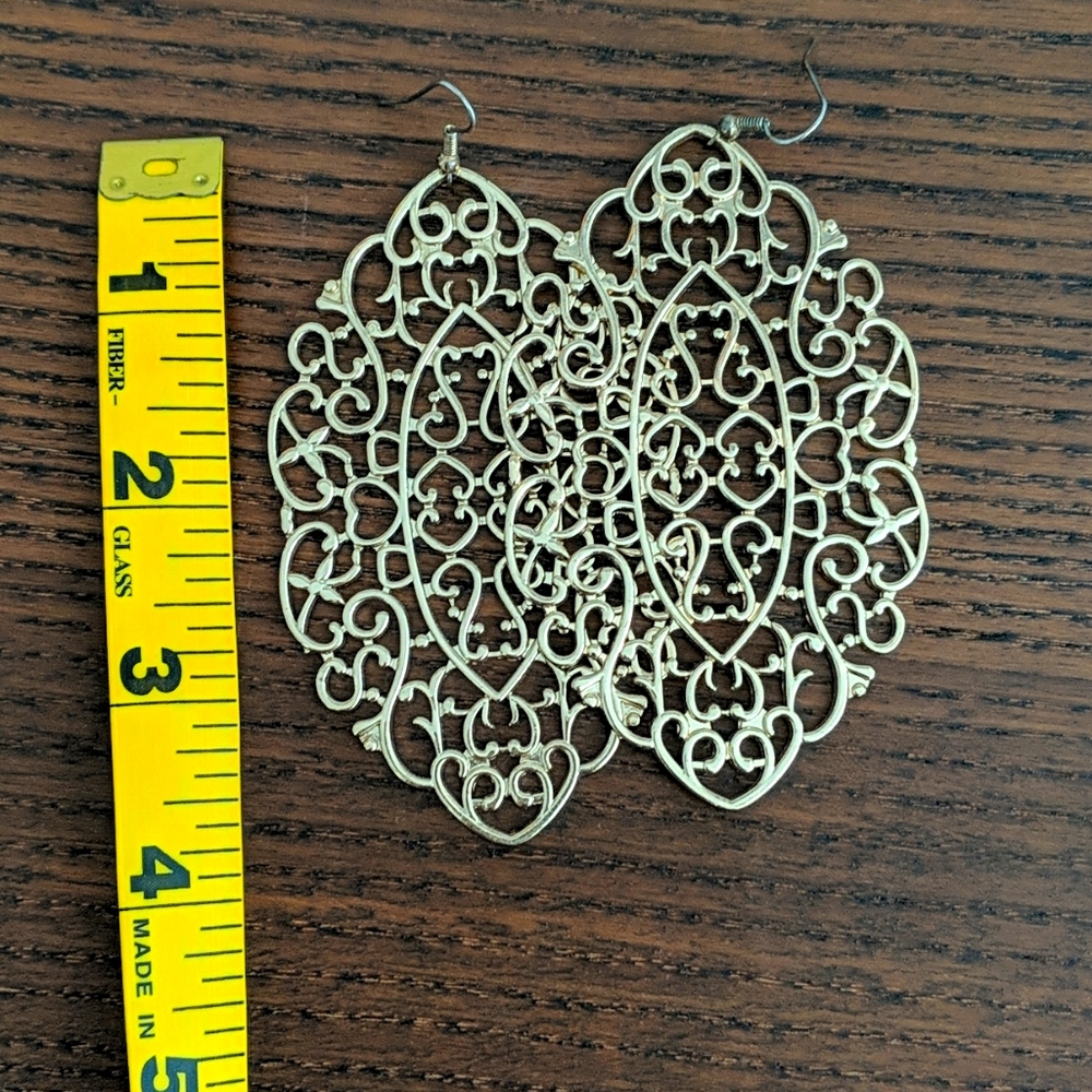 Ornate gold earrings